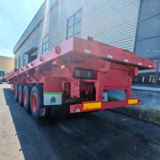 Hot Sale SINOTRUK 4 Axles 70 Tons Flatbed Trailer for Industrial Equipment Transportation