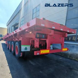 Hot Sale SINOTRUK 4 Axles 70 Tons Flatbed Trailer for Industrial Equipment Transportation